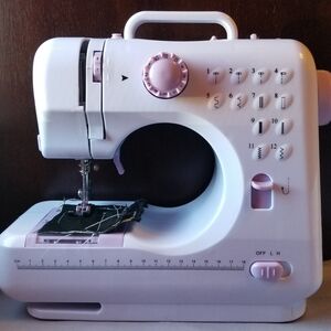 Compact Pink Sewing Machine